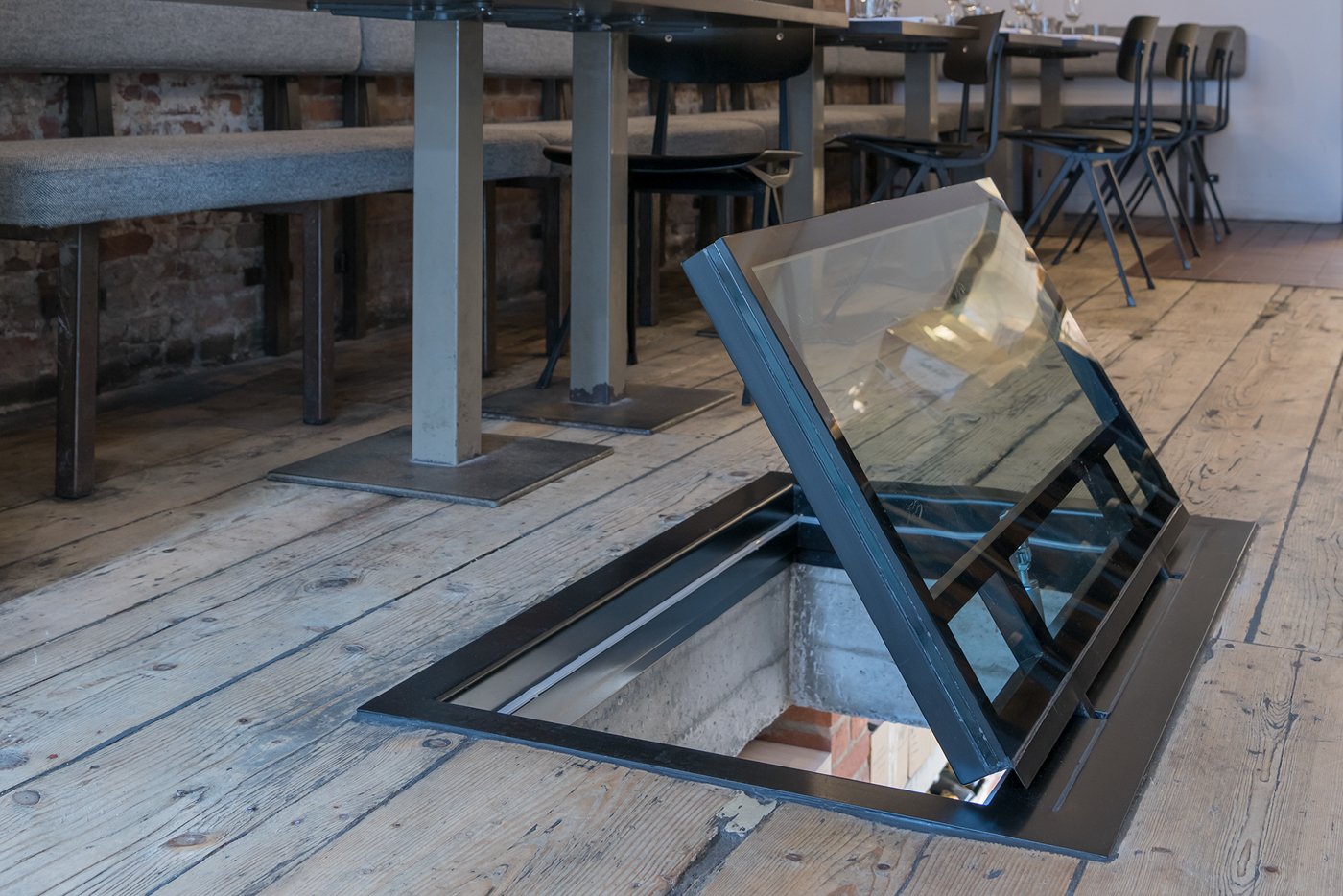 glazen vloerluik restaurant Amsterdam