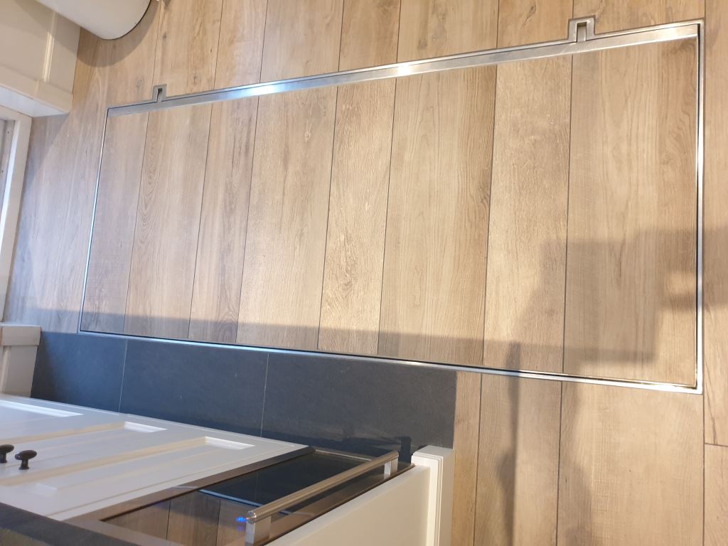 Hidden floor hatch for a basement